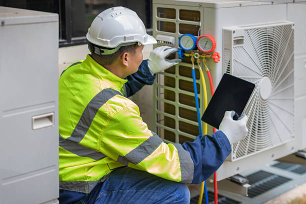Professional Hvac technician working in West Sayville, NY